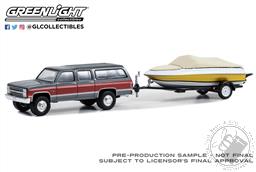 PREORDER Hitch & Tow Series 29 - 1987 Chevrolet Suburban K20 Silverado with Boat and Boat Trailer (AVAILABLE JUL-AUG 2023),Greenlight Collectibles